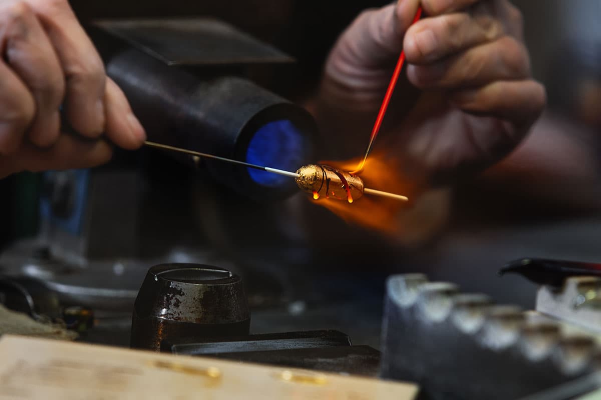 Handcrafted glass bangles in warm jewel tones